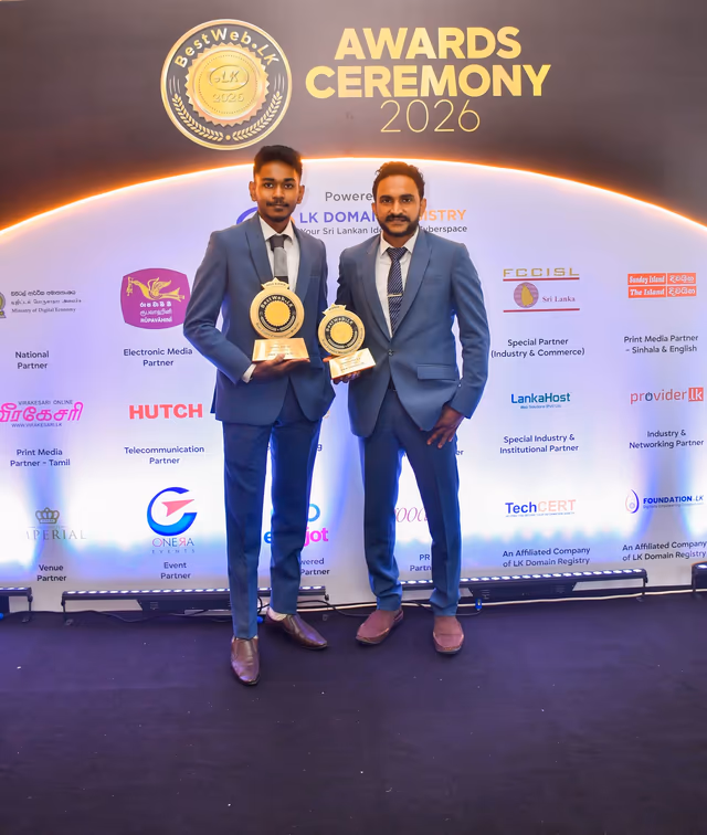 Both trophies at the ceremony backdrop, with the Zonova team.